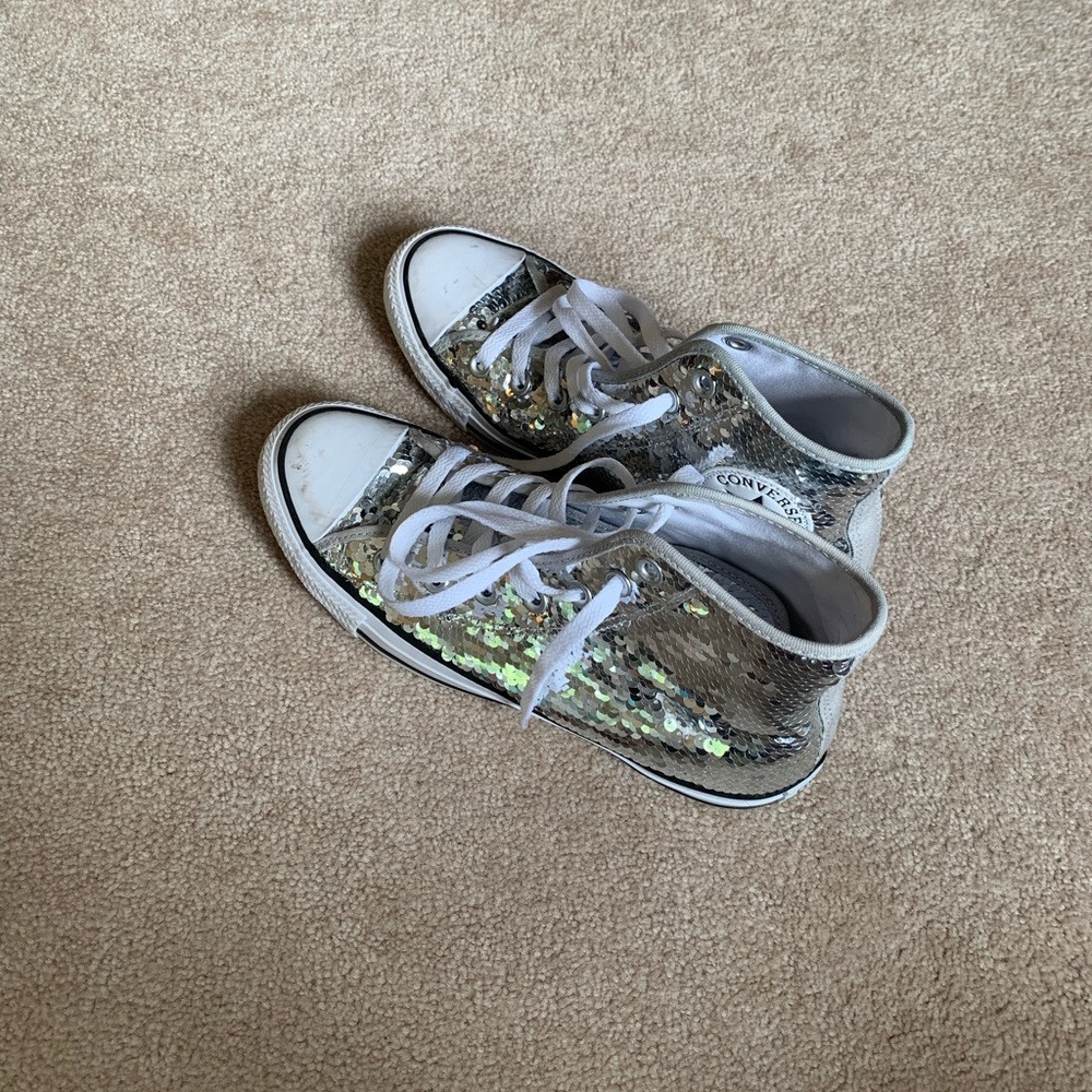 Silver sequin chucks.